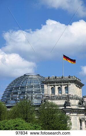 Flag fluttering on parliament building, Reichstag, Berlin, Germany View Large Photo Image Picture - Flag fluttering on parliament building, Reichstag, Berlin, Germany . Fotosearch