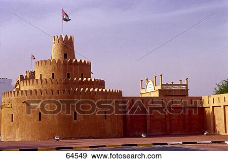 Stock Photo - Flag hosted on fort, Al Jahili Fort, Al Ain, Abu Dhabi, United Arab Emirates . Fotosearch