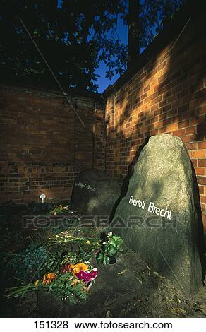 Flowers on gravestone in cemetery, Berlin, Germany View Large Photo Image Stock Photo - Flowers on gravestone in cemetery, Berlin, Germany . Fotosearch