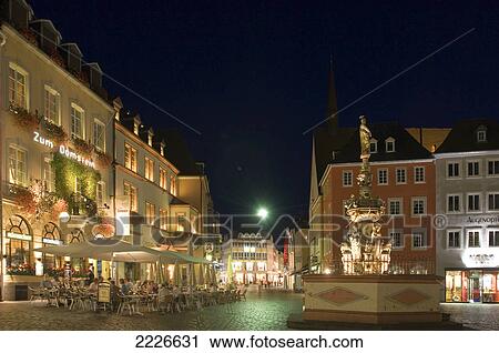 Fountain near sidewalk cafe, Petrusbrunnen, Hauptmarkt, Nuremberg, Germany View Large Photo Image Stock Image - Fountain near sidewalk cafe, Petrusbrunnen, Hauptmarkt, Nuremberg, Germany . Fotosearch