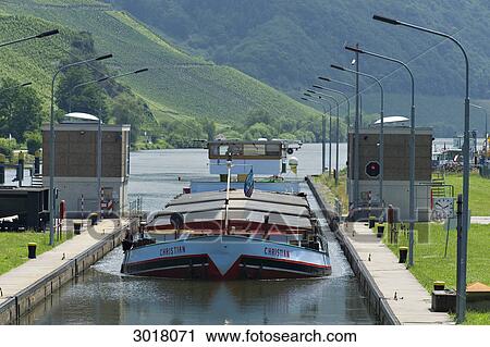Freight ship in the lock of Detzem, Rhineland-Palatinate, Germany View Large Photo Image Stock Image - Freight ship in the lock of Detzem, Rhineland-Palatinate, Germany . Fotosearch