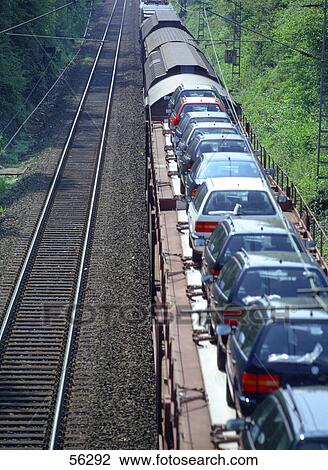 Freight train transporting cars View Large Photo Image Stock Image - Freight train transporting cars . Fotosearch
