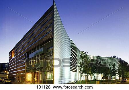 Stock Photo - Government building lit up at dusk, Nordic Embassies, Berlin, Germany . Fotosearch