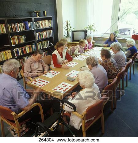 Picture - Group of senior people playing a game . Fotosearch