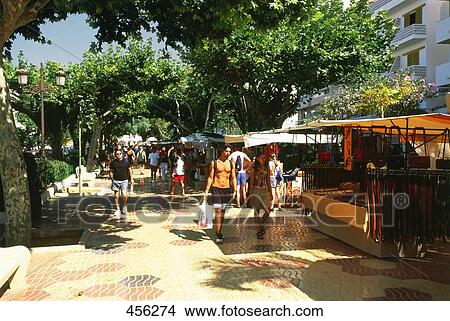 Group of tourists at market, Balearic Islands, Spain View Large Photo Image Picture - Group of tourists at market, Balearic Islands, Spain . Fotosearch