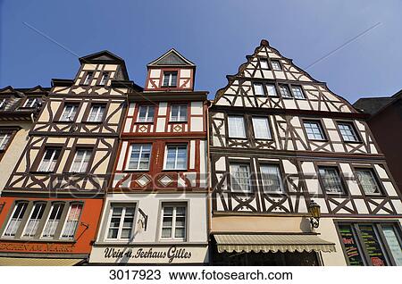 Half-timber houses at the market square of Cochem, Rhineland-Palatinate, Germany, low angle view View Large Photo Image Stock Image - Half-timber houses at the market square of Cochem, Rhineland-Palatinate, Germany, low angle view . Fotosearch