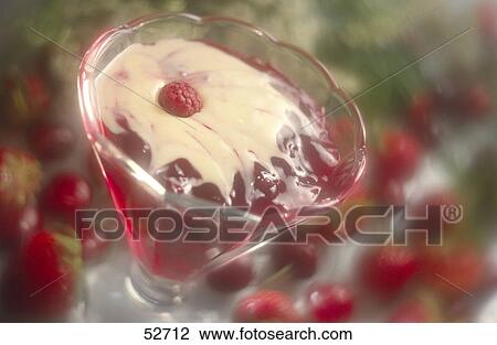 Stock Image - High angle view of a berry dessert . Fotosearch