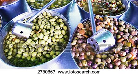 Stock Photo - High angle view of a variety of olives in buckets . Fotosearch