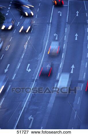 Stock Photo - High angle view of cars on road . Fotosearch