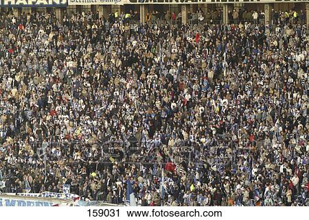 High angle view of crowd of soccer fans, Olympia station, Berlin, Germany View Large Photo Image Stock Image - High angle view of crowd of soccer fans, Olympia station, Berlin, Germany . Fotosearch