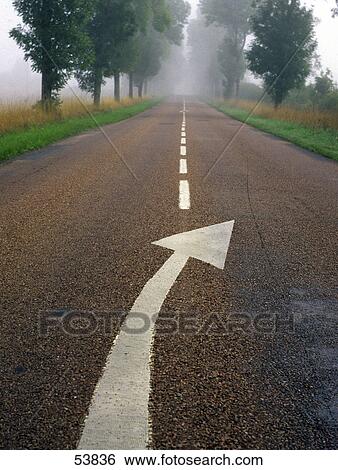 High angle view of direction sign on road View Large Photo Image Stock Photograph - High angle view of direction sign on road . Fotosearch