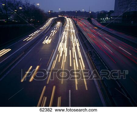 High angle view of traffic on road at night View Large Photo Image Stock Image - High angle view of traffic on road at night . Fotosearch