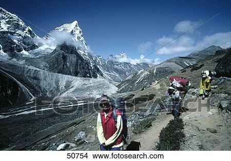 Hikers walking on trail, Himalaya, Khumbu, Nepal View Large Photo Image Picture - Hikers walking on trail, Himalaya, Khumbu, Nepal . Fotosearch