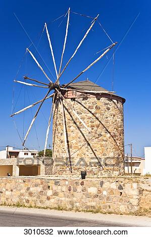 Stock Image - Historical windmill in Antimachia, Cos, Greece . Fotosearch