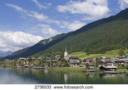 Houses and church at lakeside, Weissensee, Techendorf, Carinthia, Austria View Large Photo Image Stock Image - Houses and church at lakeside, Weissensee, Techendorf, Carinthia, Austria . Fotosearch
