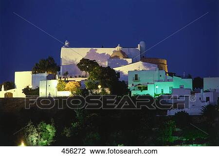 Houses on cliff at dusk, Balearic Islands, Spain View Large Photo Image Stock Image - Houses on cliff at dusk, Balearic Islands, Spain . Fotosearch