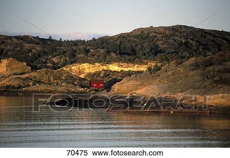 Stock Photography - Hut at lakefront . Fotosearch
