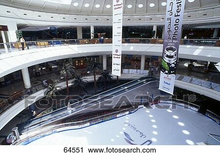 Stock Image - Ice skating area in shopping mall, Al Ain Mall, Al Ain, Abu Dhabi, United Arab Emirates . Fotosearch