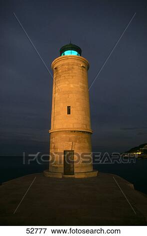 Lighthouse illuminated at night, Cassis, Provence-Alpes-Cote D'Azur, France View Large Photo Image Stock Photo - Lighthouse illuminated at night, Cassis, Provence-Alpes-Cote D'Azur, France . Fotosearch