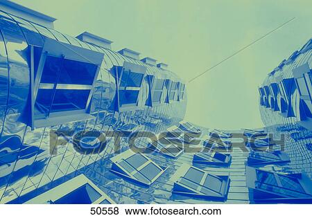 Stock Photo - Low angle view of office buildings, Neuer Zollhof, Dusseldorf, North Rhine-Westphalia, Germany . Fotosearch