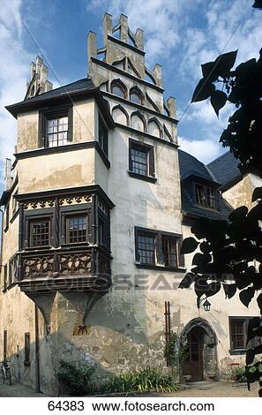 Low angle view of old building against cloudy sky, Thuringia, Germany View Large Photo Image Stock Image - Low angle view of old building against cloudy sky, Thuringia, Germany . Fotosearch