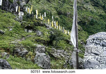 Low angle view of prayer flags in front of temple, Khumbu, Nepal, Asia View Large Photo Image Stock Image - Low angle view of prayer flags in front of temple, Khumbu, Nepal, Asia . Fotosearch