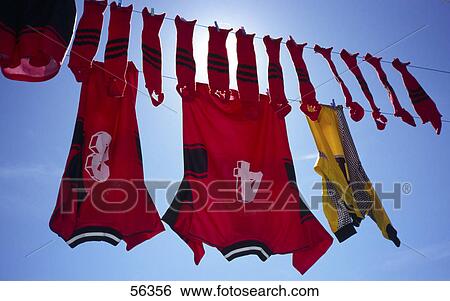 Low angle view of soccer uniform on clothesline View Large Photo Image Stock Photograph - Low angle view of soccer uniform on clothesline . Fotosearch