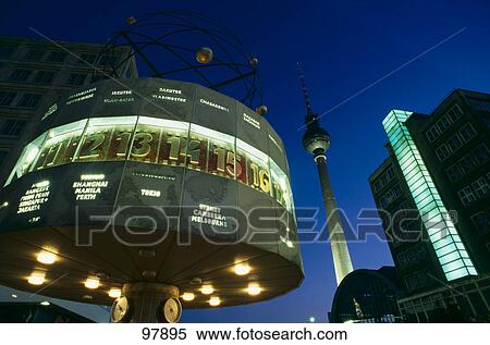 Stock Photography - Low angle view of time zone clock, Alexanderplatz, Berlin, Germany . Fotosearch