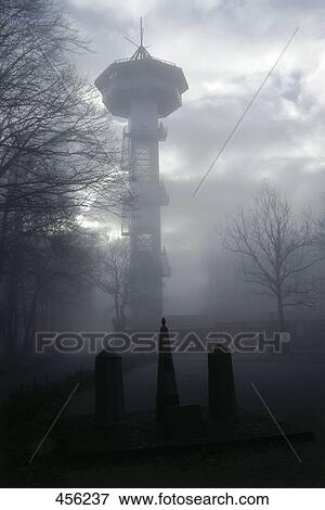 Low angle view of town against overcast sky, Belgium View Large Photo Image Stock Photo - Low angle view of town against overcast sky, Belgium . Fotosearch