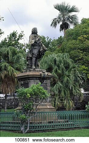 Stock Image - Mahe de la bourdonnais statue in park, St-Denis, Reunion Island, France . Fotosearch