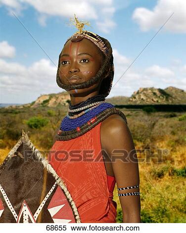 Massai warrior holding shield, Kenia View Large Photo Image Stock Photography - Massai warrior holding shield, Kenia . Fotosearch
