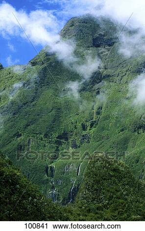 Mist over mountain peak, Cilaos, Reunion Island, France View Large Photo Image Stock Image - Mist over mountain peak, Cilaos, Reunion Island, France . Fotosearch