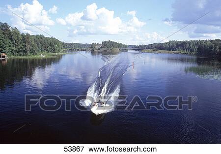 Motorboat in lake View Large Photo Image Stock Photo - Motorboat in lake . Fotosearch