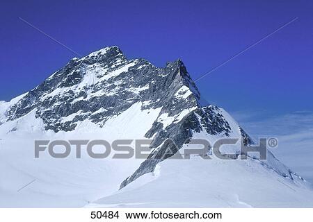 Mountain peak covering with snow, Swiss Alps, Switzerland View Large Photo Image Picture - Mountain peak covering with snow, Swiss Alps, Switzerland . Fotosearch