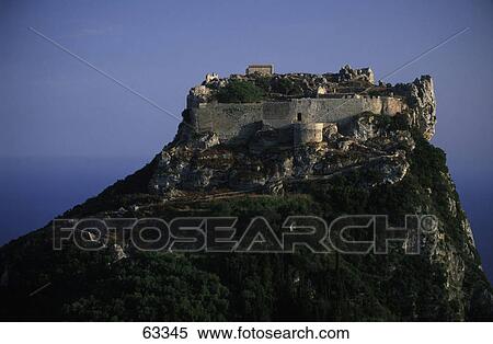 Stock Photography - Old ruins of castle on hill, Angelokastro, Corfu, Ionian Islands, Greece . Fotosearch