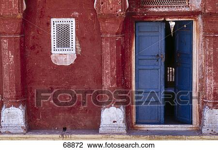 Open door of red painted house, Lahore, Pakistan View Large Photo Image Stock Image - Open door of red painted house, Lahore, Pakistan . Fotosearch