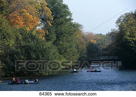 Stock Photography - People boating in lake, Dresden, Lower Saxony, Germany People boating in lake, Dresden, Lower Saxony, Germany . Fotosearch