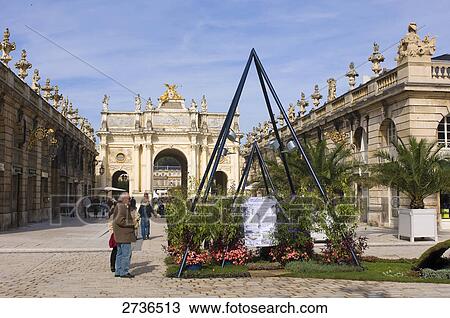 Stock Image - People in palace, Place Stanislas, Nancy, Meurthe et Moselle, France . Fotosearch