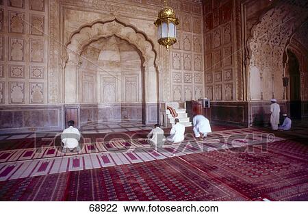 People praying in mosque, Badshahi Masjid, Lahore, Pakistan View Large Photo Image Stock Image - People praying in mosque, Badshahi Masjid, Lahore, Pakistan . Fotosearch
