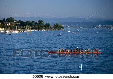People rowing boat in lake, Zurich, Switzerland View Large Photo Image Stock Photograph - People rowing boat in lake, Zurich, Switzerland . Fotosearch