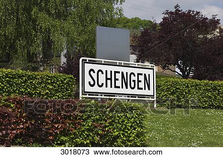 Place-name sign of Schengen in front of hedge, Schengen, Luxembourg View Large Photo Image Stock Image - Place-name sign of Schengen in front of hedge, Schengen, Luxembourg . Fotosearch
