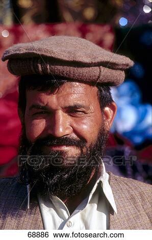 Portrait of beard Turkish man smiling View Large Photo Image Stock Photograph - Portrait of beard Turkish man smiling . Fotosearch