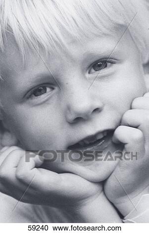Stock Image - Portrait of boy smiling . Fotosearch