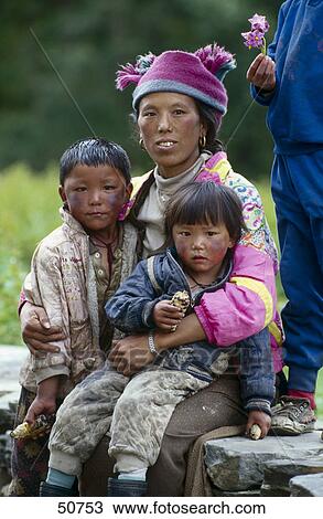 Portrait of Sherpa woman sitting with her children, Khumbu, Nepal View Large Photo Image Stock Image - Portrait of Sherpa woman sitting with her children, Khumbu, Nepal . Fotosearch