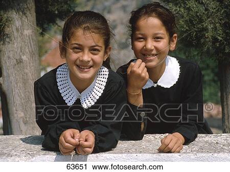 Portrait of two girls smiling, Turkey View Large Photo Image Stock Image - Portrait of two girls smiling, Turkey . Fotosearch