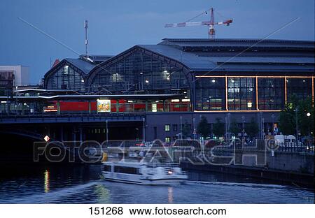 Railway station at waterfront, Friedrichstrasse Railway Station, Spree River, Berlin, Germany View Large Photo Image Stock Photo - Railway station at waterfront, Friedrichstrasse Railway Station, Spree River, Berlin, Germany . Fotosearch