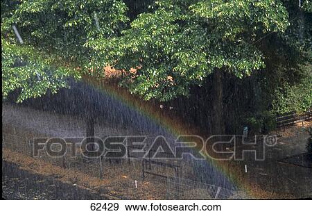 Rainbow over park View Large Photo Image Stock Photo - Rainbow over park . Fotosearch