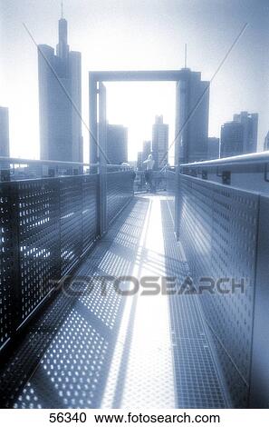 Rear view of woman taking photographs of skyscrapers, Frankfurt, Germany, Europe View Large Photo Image Stock Image - Rear view of woman taking photographs of skyscrapers, Frankfurt, Germany, Europe . Fotosearch