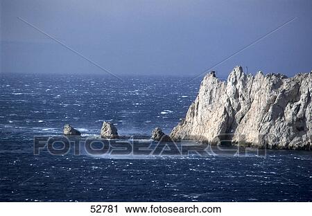 Rock formation in sea, Calanque, Provence-Alpes-Cote D'Azur, France View Large Photo Image Stock Image - Rock formation in sea, Calanque, Provence-Alpes-Cote D'Azur, France . Fotosearch