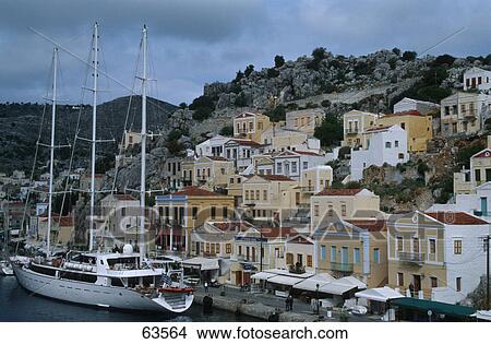 Sailboat moored at harbor, Dodecanese Islands, Greece View Large Photo Image Picture - Sailboat moored at harbor, Dodecanese Islands, Greece . Fotosearch